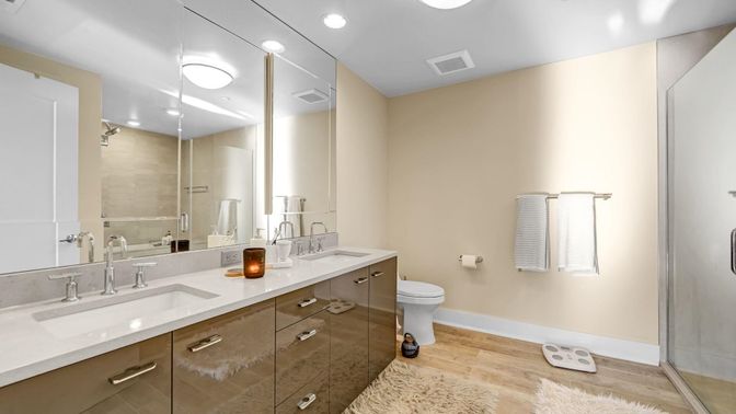 Bathroom, Dual Sink Vanities, Glass Shower, Interior, Recessed Lighting, Wood Texture Flooring