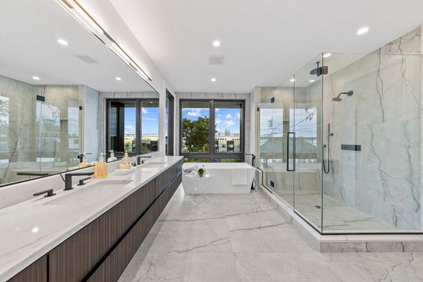 Bathroom, Dual Sink Vanities, Free Standing Baths, Glass Shower, Interior, Marble, Marble Walls, Recessed Lighting