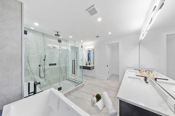 Bathroom, Dual Sink Vanities, Free Standing Baths, Glass Shower, Interior, Marble, Marble Walls, Recessed Lighting