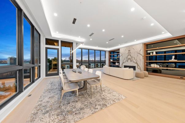 Dining room, Fireplace, Interior, Living room, Marble Walls, Pendant Lights, Recessed Lighting, Wood Texture Flooring