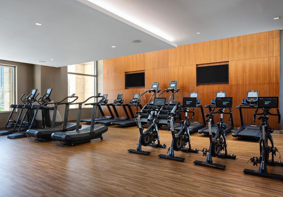 Fitness Equipment, Gym, Interior, Recessed Lighting, Wood Texture Flooring, Wooden Walls