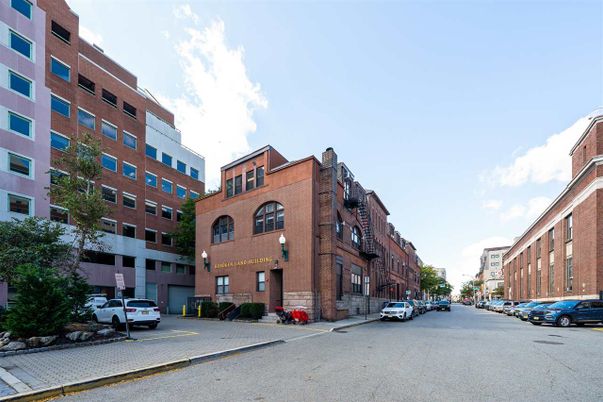 Exterior, Facade, Brick Facade, Condo Building