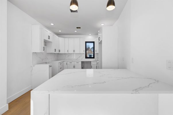 Interior, Kitchen, Marble Walls, Recessed Lighting, Wood Texture Flooring