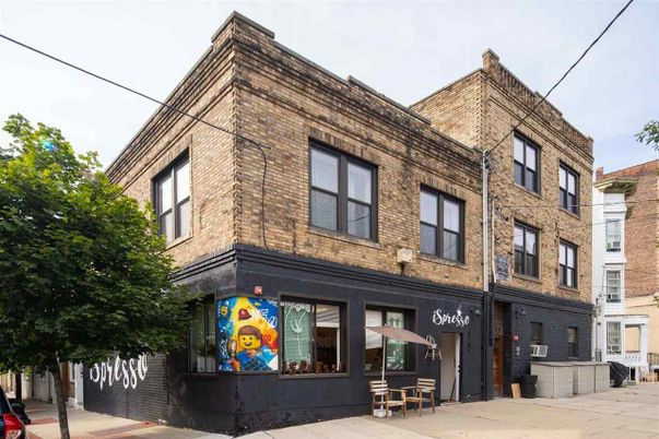 Exterior, Facade, Brick Facade, Condo Building