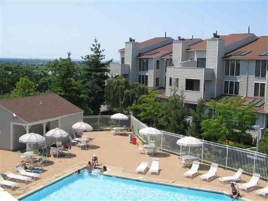 Exterior, Pool, Solar Panels
