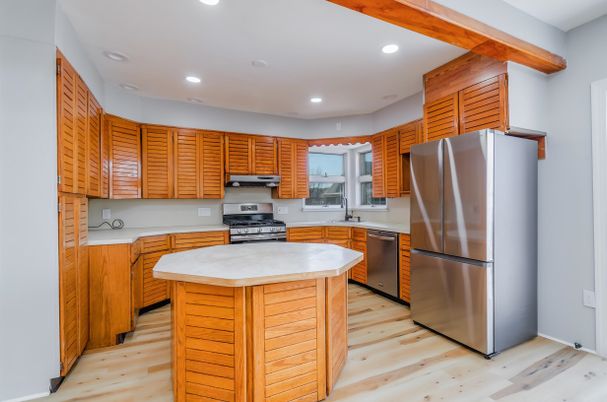 Interior, Kitchen, Recessed Lighting, Stainless Steel Appliances, Wood Texture Flooring