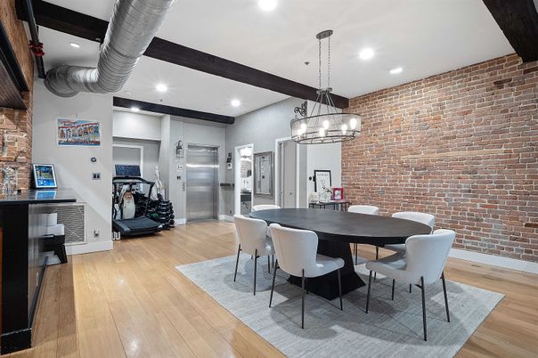 Dining room, Fitness Equipment, Interior, Pendant Lights, Recessed Lighting, Stone Walls, Wooden Beams, Wood Texture Flooring