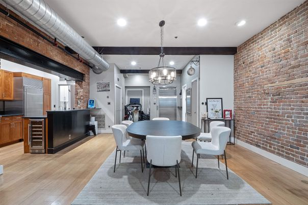 Dining room, Interior, Kitchen, Pendant Lights, Recessed Lighting, Stainless Steel Appliances, Stone Walls, Wood Texture Flooring