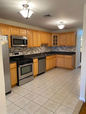 Interior, Kitchen, Marble Walls, Stainless Steel Appliances