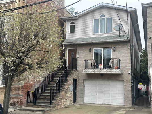 Attached, Exterior, Facade, Brick Facade, American Foursquare