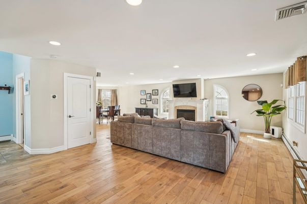 Dining room, Fireplace, Interior, Living room, Recessed Lighting, Wood Texture Flooring