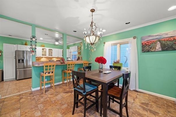 Chandelier, Dining room, Interior, Kitchen, Pendant Lights, Recessed Lighting, Stainless Steel Appliances