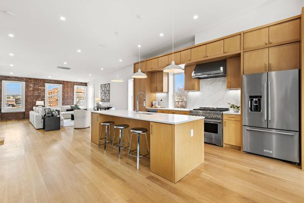 Interior, Kitchen, Living room, Pendant Lights, Recessed Lighting, Stainless Steel Appliances, Stone Walls, Wood Texture Flooring