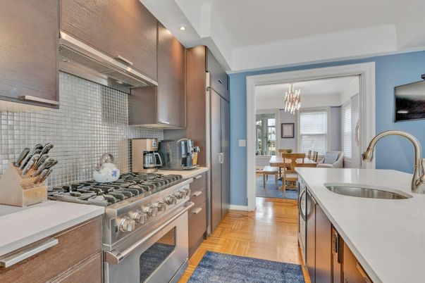 Chandelier, Dining room, Interior, Kitchen, Recessed Lighting, Stainless Steel Appliances, Wood Texture Flooring