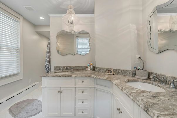 Bathroom, Chandelier, Dual Sink Vanities, Interior, Marble, Pendant Lights, Recessed Lighting