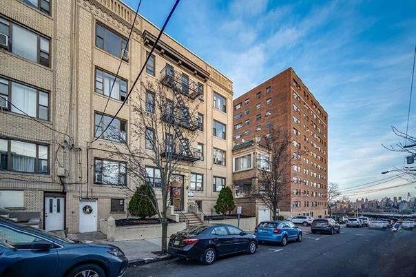 Exterior, Facade, Brick Facade, Condo Building