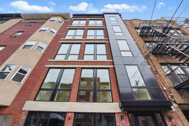 Exterior, Facade, Brick Facade, Rowhouse