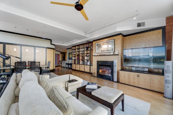 Dining room, Fireplace, Interior, Living room, Pendant Lights, Recessed Lighting, Stone Walls, Wood Texture Flooring