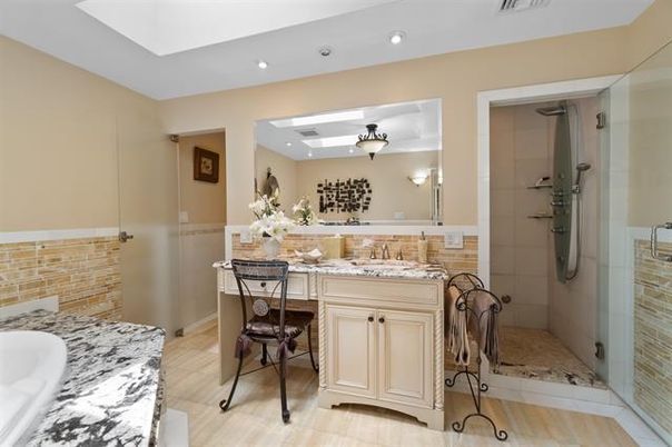 Bathroom, Dual Sink Vanities, Glass Shower, Interior, Recessed Lighting, Wood Texture Flooring