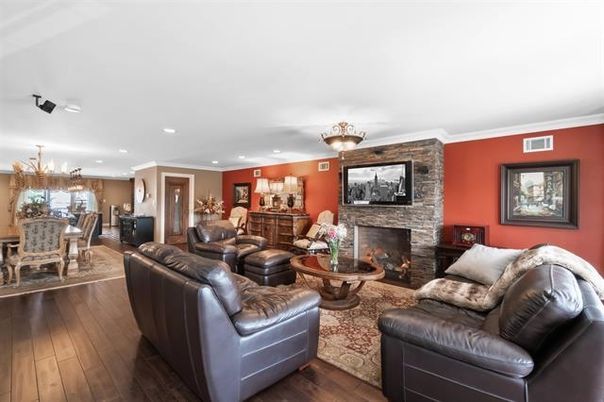 Chandelier, Dining room, Fireplace, Interior, Kitchen, Living room, Recessed Lighting, Stone Walls, Wood Texture Flooring