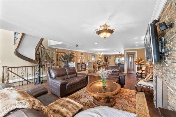 Chandelier, Dining room, Fireplace, Interior, Kitchen, Living room, Pendant Lights, Recessed Lighting, Stone Walls, Wood Texture Flooring