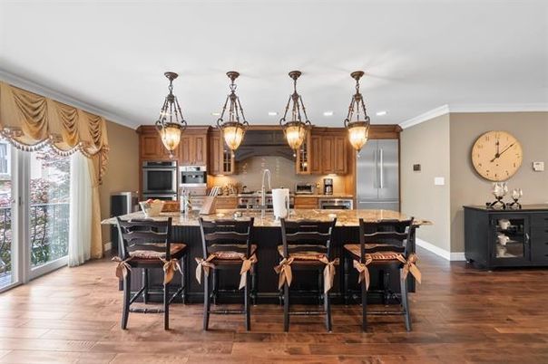 Dining room, Interior, Kitchen, Pendant Lights, Recessed Lighting, Stainless Steel Appliances, Wood Texture Flooring