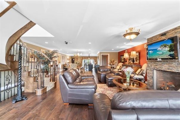 Chandelier, Dining room, Fireplace, Interior, Kitchen, Living room, Recessed Lighting, Stone Walls, Wood Texture Flooring