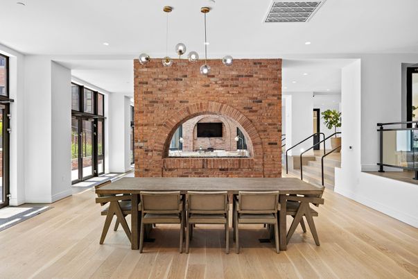 Dining room, Fireplace, Interior, Pendant Lights, Recessed Lighting, Stone Walls, Wood Texture Flooring