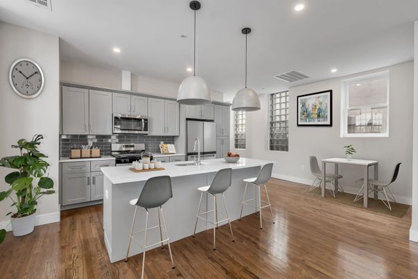 Dining room, Interior, Kitchen, Pendant Lights, Recessed Lighting, Stainless Steel Appliances, Wood Texture Flooring