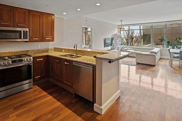 Chandelier, Dining room, Interior, Kitchen, Recessed Lighting, Stainless Steel Appliances, Wood Texture Flooring