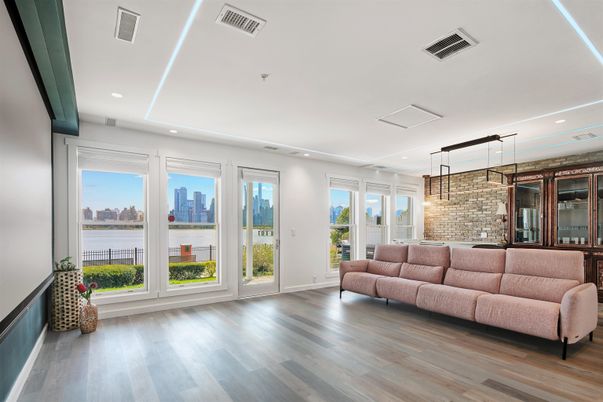 Interior, Living room, Recessed Lighting, Stone Walls, Water, Wood Texture Flooring