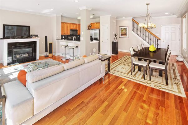 Chandelier, Dining room, Fireplace, Interior, Kitchen, Living room, Recessed Lighting, Wood Texture Flooring