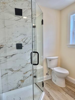Bathroom, Glass Shower, Interior, Marble Walls, Wood Texture Flooring