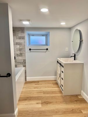 Bathroom, Dual Sink Vanities, Interior, Recessed Lighting, Wood Texture Flooring