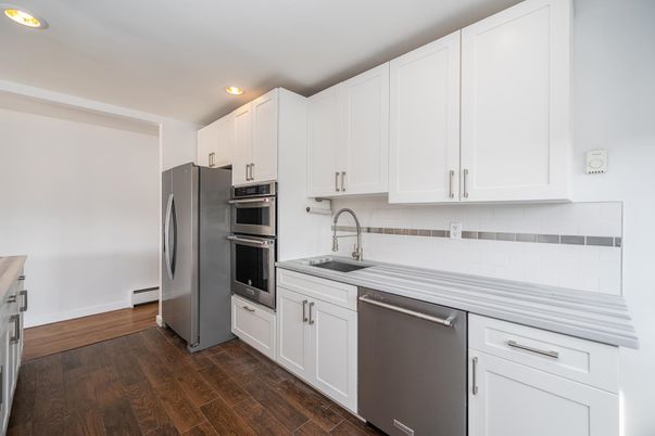 Interior, Kitchen, Recessed Lighting, Stainless Steel Appliances, Wood Texture Flooring