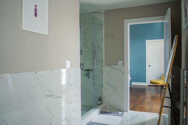 Bathroom, Glass Shower, Interior, Marble Walls, Wood Texture Flooring