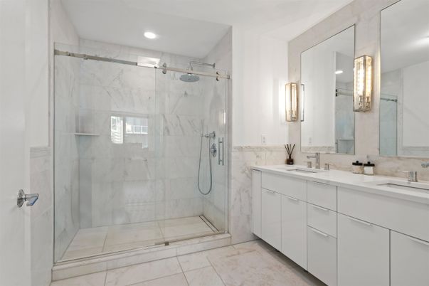 Bathroom, Dual Sink Vanities, Glass Shower, Interior, Marble Walls, Recessed Lighting