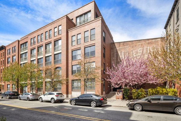 Exterior, Facade, Brick Facade, Condo Building