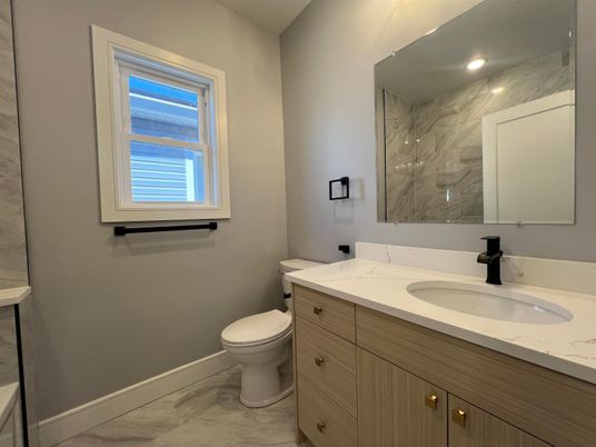 Bathroom, Dual Sink Vanities, Interior, Marble, Marble Walls, Recessed Lighting