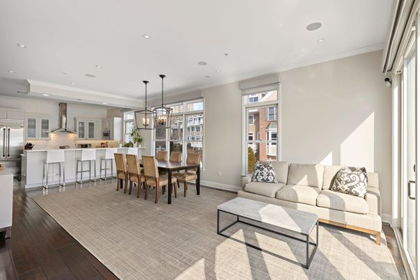 Chandelier, Dining room, Interior, Kitchen, Living room, Pendant Lights, Recessed Lighting, Stainless Steel Appliances, Wood Texture Flooring
