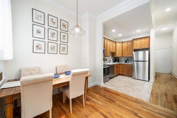 Dining room, Interior, Kitchen, Pendant Lights, Recessed Lighting, Stainless Steel Appliances, Wood Texture Flooring