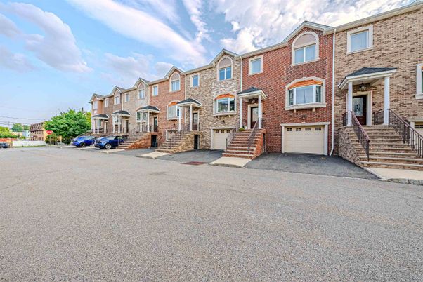 Attached, Exterior, Facade, Brick Facade, Rowhouse