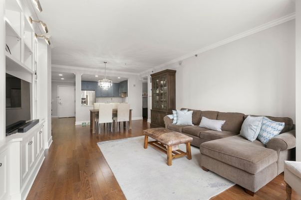 Chandelier, Dining room, Interior, Kitchen, Living room, Pendant Lights, Recessed Lighting, Stainless Steel Appliances, Wood Texture Flooring