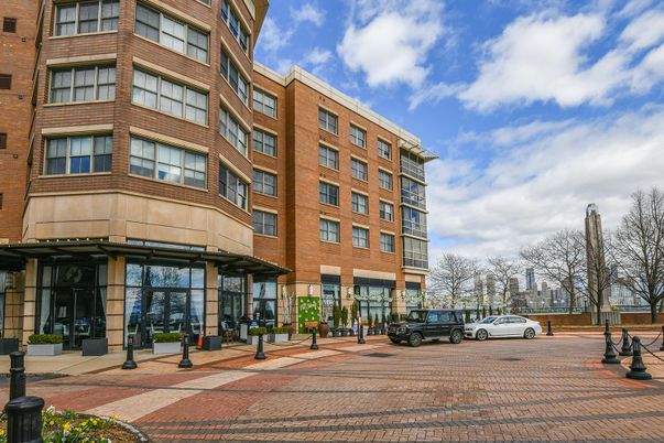 Exterior, Facade, Brick Facade, Condo Building