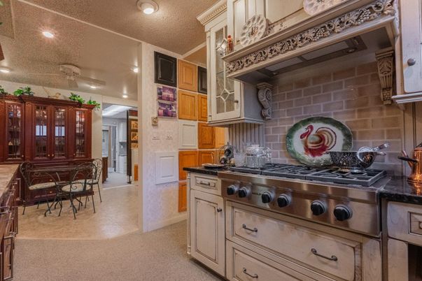 Dining room, Interior, Kitchen, Recessed Lighting, Stainless Steel Appliances, Stone Walls