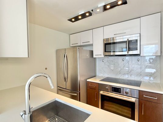 Interior, Kitchen, Marble Walls, Stainless Steel Appliances
