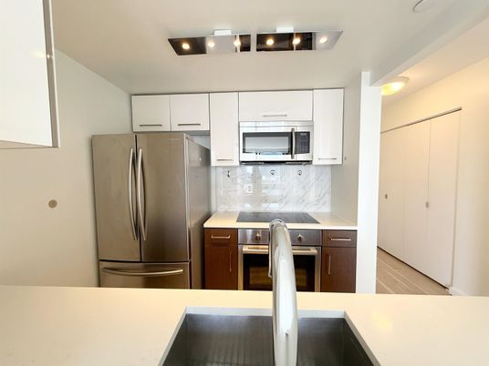 Interior, Kitchen, Marble Walls, Stainless Steel Appliances