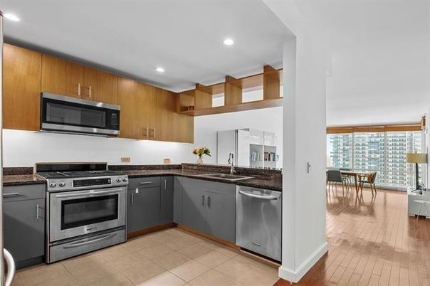 Dining room, Interior, Kitchen, Recessed Lighting, Stainless Steel Appliances, Wood Texture Flooring