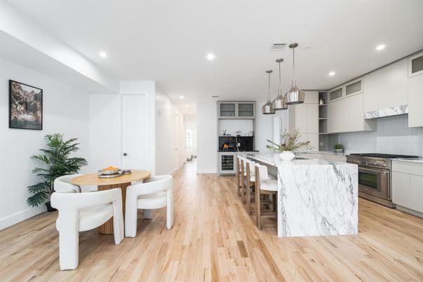 Dining room, Interior, Kitchen, Pendant Lights, Recessed Lighting, Stainless Steel Appliances, Wood Texture Flooring