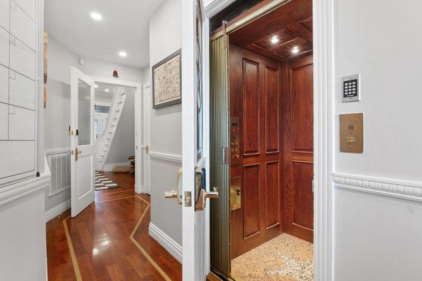 Elevator, Interior, Recessed Lighting, Wooden Ceilings, Wood Texture Flooring, Wooden Walls